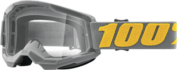 100% Goggles Strata 2 Izipizi - Klar med grå ram och gul logotyp på elastiskt band. Perfekta motocrossglasögon för skydd och klar sikt.